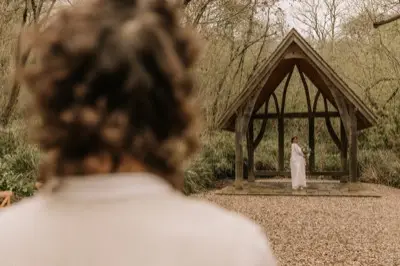 The oak arbour from behind, the couple beneath it