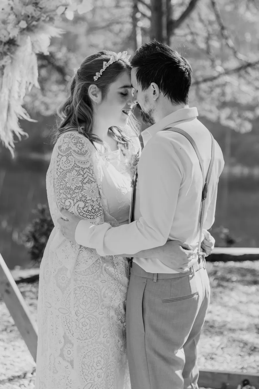 A couple hold each other close beside the Blue Pool, Wareham
